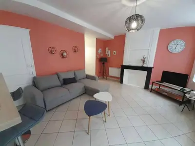 Coin salon dans l'établissement Appart chaleureux avec terrasse