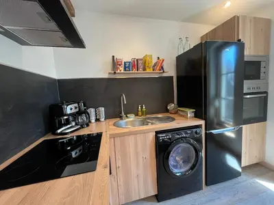 Cuisine ou kitchenette dans l'établissement Côté Médicis - Cosy appartement au coeur de Blois