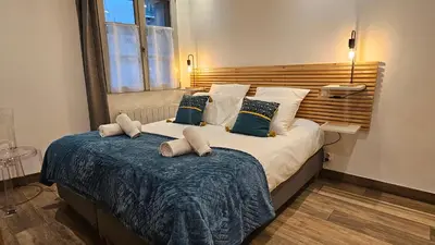 Un ou plusieurs lits dans un hébergement de l'établissement Duplex élégant Tours quais de Loire