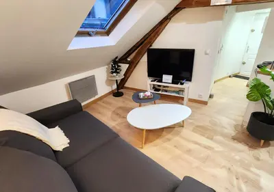 Télévision ou salle de divertissement dans l'établissement Le 6ème ciel de Gutenberg - climatisé