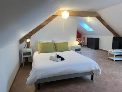 Un ou plusieurs lits dans un hébergement de l'établissement Le studio de Mamy Jacquotte Centre Cour-Cheverny