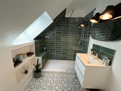 Salle de bains dans l'établissement Gîte Les Raudières 3 étoiles - Piscine et Spa