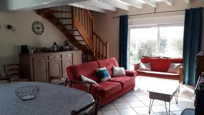 Coin salon dans l'établissement Gîte La Fortaiserie