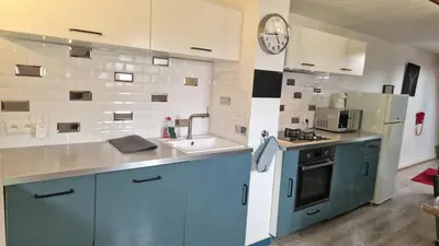Cuisine ou kitchenette dans l'établissement Le Refuge des Bords de Loire