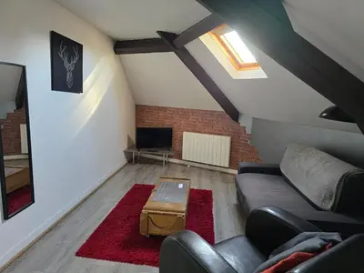 Coin salon dans l'établissement Le Refuge des Bords de Loire