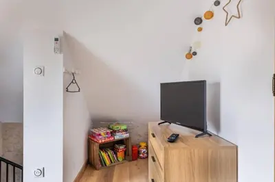 Télévision ou salle de divertissement dans l'établissement Gîte Le Clos Controis