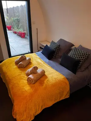 Un ou plusieurs lits dans un hébergement de l'établissement Magnifique loft 130m2 Le Mans
