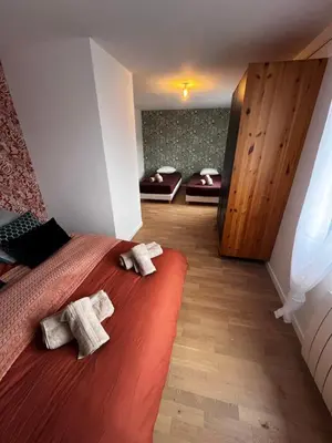 Un ou plusieurs lits dans un hébergement de l'établissement Magnifique loft 130m2 Le Mans