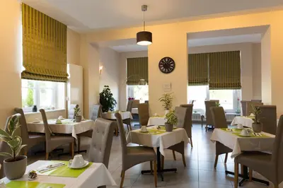 Coin salon dans l'établissement Hôtel Le Haut des Lys