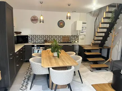 Cuisine ou kitchenette dans l'établissement L’Éden