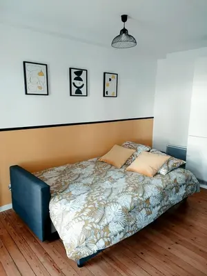 Un ou plusieurs lits dans un hébergement de l'établissement C'COZY - grande maison calme et lumineuse