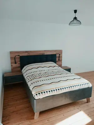 Un ou plusieurs lits dans un hébergement de l'établissement C'COZY - grande maison calme et lumineuse