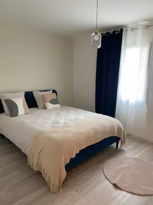Un ou plusieurs lits dans un hébergement de l'établissement Maison By Sana proche du lac