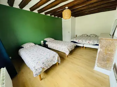 Un ou plusieurs lits dans un hébergement de l'établissement La Maison de Marion