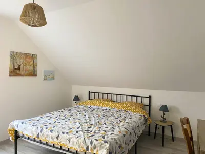 Un ou plusieurs lits dans un hébergement de l'établissement Le Clos Aime