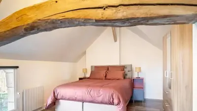 Un ou plusieurs lits dans un hébergement de l'établissement Gîte 21 route de saumur