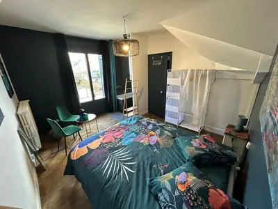 Un ou plusieurs lits dans un hébergement de l'établissement Maison de ville idéalement placée
