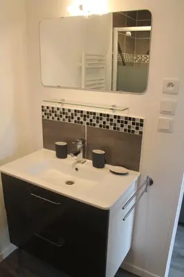 Salle de bains dans l'établissement Le Champ De La Ferme