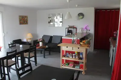 Coin salon dans l'établissement Le Champ De La Ferme