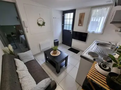 Télévision ou salle de divertissement dans l'établissement Agréable Logement / Netflix