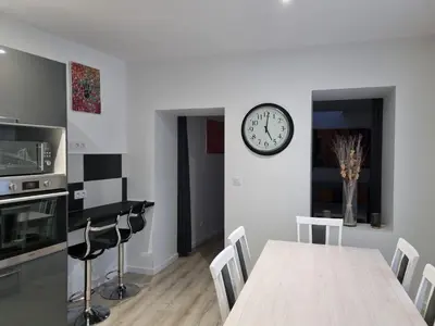 Cuisine ou kitchenette dans l'établissement Au Petit Ronceraie