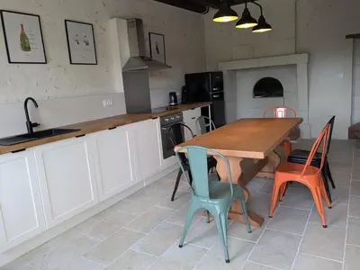 Cuisine ou kitchenette dans l'établissement Maison dans belle longère - La Serrerie