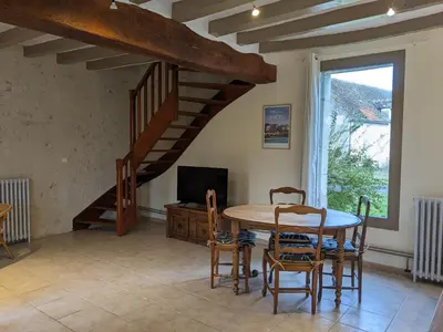 Télévision ou salle de divertissement dans l'établissement Maison dans belle longère - La Serrerie