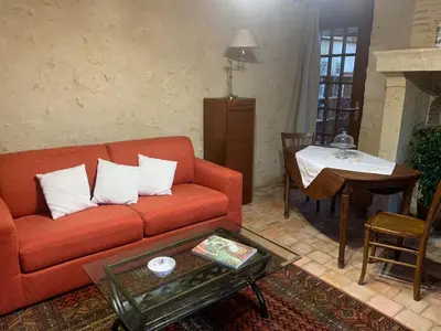 Coin salon dans l'établissement Capucine