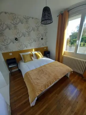 Un ou plusieurs lits dans un hébergement de l'établissement Maison 6 couchages avec jardin au coeur des châteaux de la Loire
