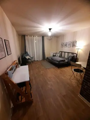 Coin salon dans l'établissement Studio agréable dans résidence