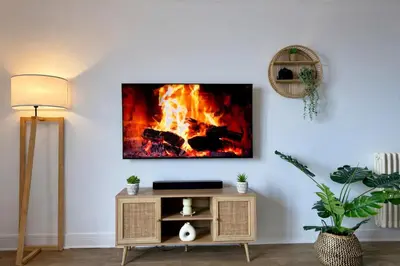 Télévision ou salle de divertissement dans l'établissement Escapade Confort à Blois - Parking Privé