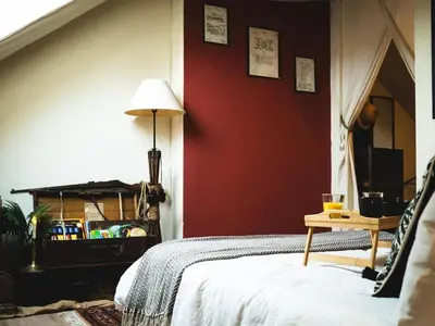 Un ou plusieurs lits dans un hébergement de l'établissement L'Insolite, expérience safari chic à Saumur