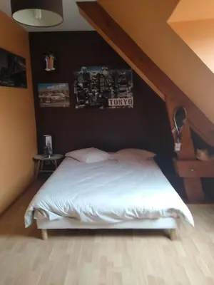 Un ou plusieurs lits dans un hébergement de l'établissement Les stands 4 chambres - lits doubles