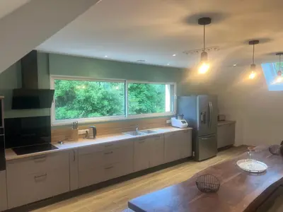 Cuisine ou kitchenette dans l'établissement Le Refuge