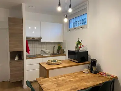 Cuisine ou kitchenette dans l'établissement Nid douillet tout équipé