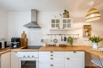 Cuisine ou kitchenette dans l'établissement Chaleureuse maisonnette