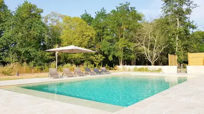 Piscine de l'établissement Gite du Four à Pain 4* - Le Domaine des Cyclamens ou située à proximité