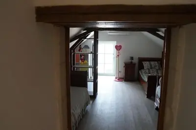 Un ou plusieurs lits dans un hébergement de l'établissement Gîte Aliénor en Anjou