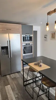 Cuisine ou kitchenette dans l'établissement Le Petit Caporal - Cour Privée - Parking Privée