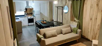 Coin salon dans l'établissement Appartement 2 chambres avec WIFI Centre de Descartes
