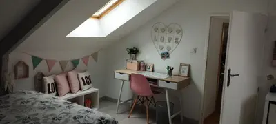 Un ou plusieurs lits dans un hébergement de l'établissement Chambres dans maison campagne circuit LE MANS