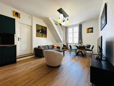 Télévision ou salle de divertissement dans l'établissement Home de Vitruve