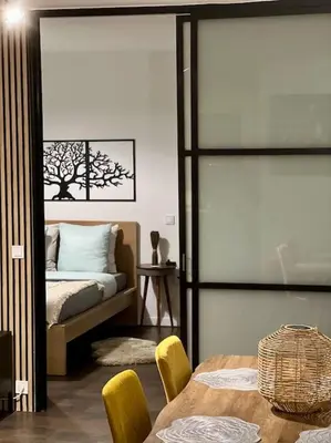Un ou plusieurs lits dans un hébergement de l'établissement Appartement grande terrasse proche de Tours centre