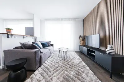 Télévision ou salle de divertissement dans l'établissement Appartement grande terrasse proche de Tours centre