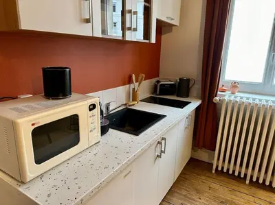 Cuisine ou kitchenette dans l'établissement La Passion - 3 personnes - Gare - BCLA