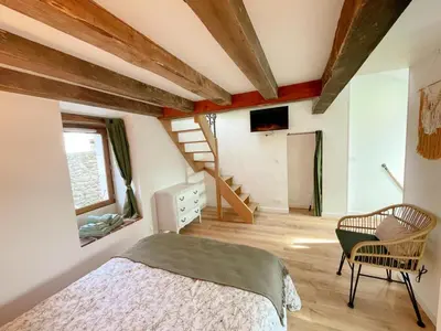 Un ou plusieurs lits dans un hébergement de l'établissement Cosy Gîte à Azay-le-Rideau avec Wifi, Clim, tout inclus, idéal pour 2 adultes et 2 enfants, proche châteaux - FR-1-381-567