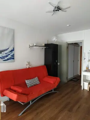 Coin salon dans l'établissement Grand studio idéalement situé
