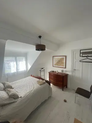 Un ou plusieurs lits dans un hébergement de l'établissement Appartement Mansoreau