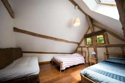 Un ou plusieurs lits dans un hébergement de l'établissement Holiday home Le Vaugarnier