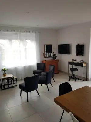 Télévision ou salle de divertissement dans l'établissement Mon Gîte